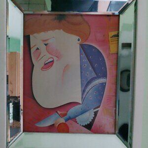 Risko caricature of Julia Child in deep set mirrored frame.